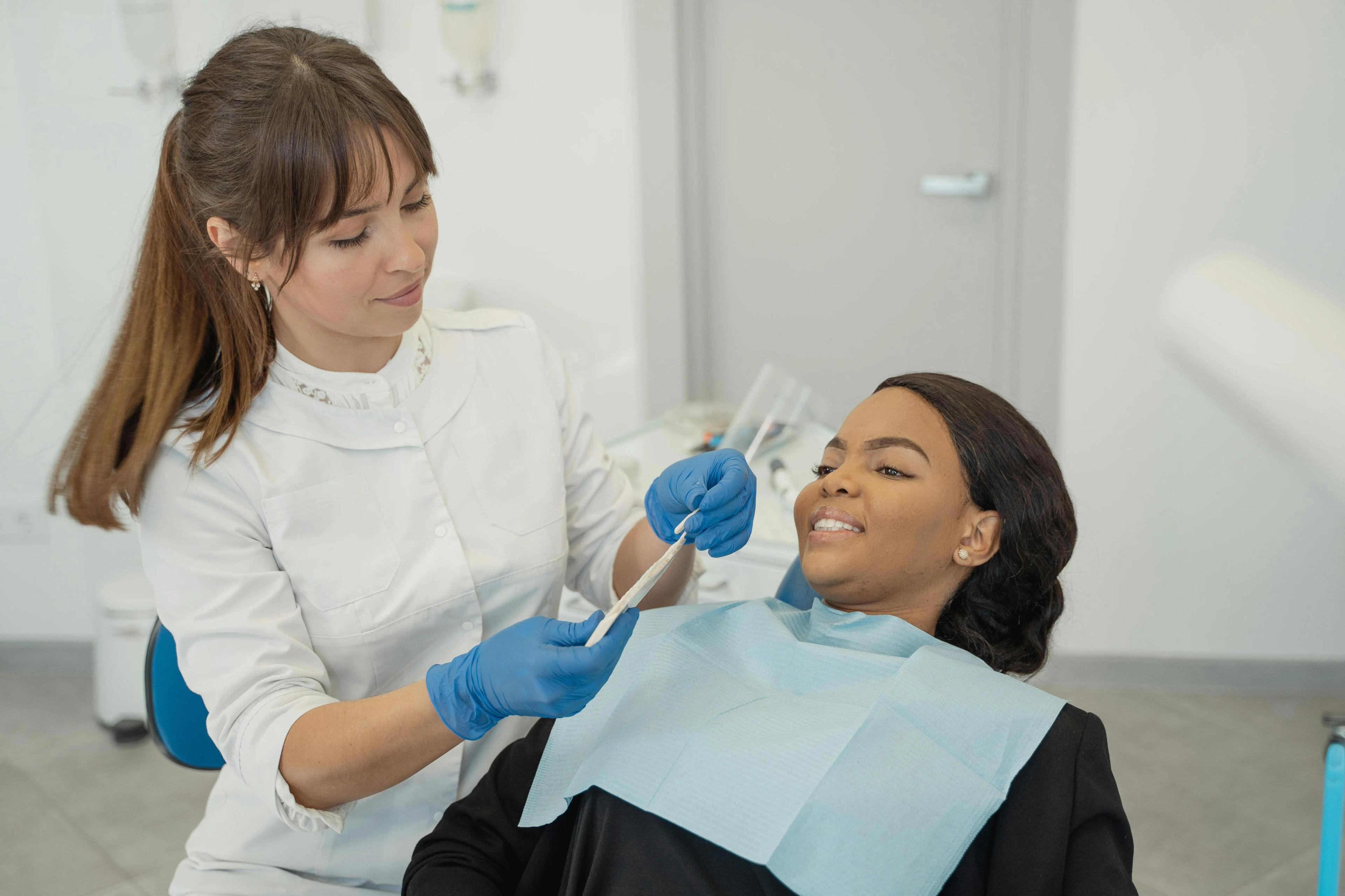 Teeth being whitened